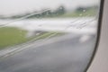 Rain drops on the window of the plane