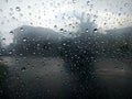 Raindrop, water drops on a glass surface of car window Royalty Free Stock Photo