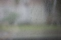 Rain drops on window. Rainy day. Bad weather background. Raindrops in glass surface. Water drops on car window. Water condensation Royalty Free Stock Photo