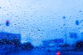 Rain drops on window on road