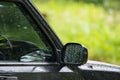 Rain drops on window and side mirror glass of the car, Abstract Royalty Free Stock Photo