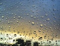 Rain drops on the window, sunset in background, stormy clouds behind #3 Royalty Free Stock Photo