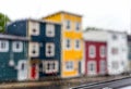 Rain drops on windows with jellybean houses in Newfoundland