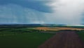 Rain falling in the distance from above. atmospheric phenomenon