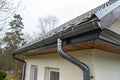 Rain gutter of roof with downpipe Royalty Free Stock Photo