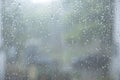 This footage fits a sad mood, a lonely person looking out the window with raindrops outside. It gives off a cold, lonely feeling, Royalty Free Stock Photo