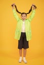 Rain is not hindrance. small girl have fun in raincoat. active schoolgirl waterproof cloak. water resistant clothes. in Royalty Free Stock Photo