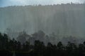 Rain over forest mountains. Misty mountain landscape hills at rainy day Royalty Free Stock Photo
