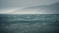 Rain over the stormy sea Royalty Free Stock Photo