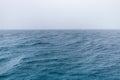 Soft rain ocean background of blue sea with clear sky and horizon Royalty Free Stock Photo