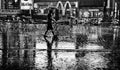 Man in rain in Times Square, New York