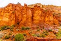 Rain pouring down on the geological formations of the red sandstone buttes surrounding the Chapel of the Holy Cross at Sedona Royalty Free Stock Photo