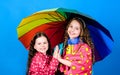 Rain protection. Rainbow. autumn fashion. happy little girls with colorful umbrella. cheerful hipster children