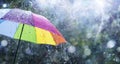 Rain On Rainbow Umbrella - Weather Concept - Spring And Fall Shower Royalty Free Stock Photo