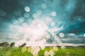 Rain Rainy Clouds Above Countryside Rural Field Landscape With Young Green Wheat Sprouts In Summer Cloudy Sunset Evening Royalty Free Stock Photo