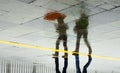 Rain reflection umbrella Two women walking in the rain