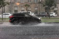 Rain road driving  flood puddle autumn drops Royalty Free Stock Photo