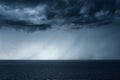 Rain on the sea with stormy clouds Royalty Free Stock Photo