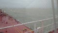 Rain sea tanker storm wind wave Royalty Free Stock Photo