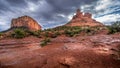 After rain showers, streams and puddles forming at Bell Rock and Courthouse Butte, famous red rocks at Sedona Royalty Free Stock Photo