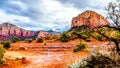 After rain showers, streams and puddles forming at Courthouse Butte, a famous red rock between the Village of Oak Creek and Sedona Royalty Free Stock Photo