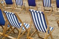 Rain soaked deck chairs Royalty Free Stock Photo