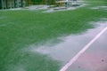 Rain Soccer field with grass green football. line turf Royalty Free Stock Photo