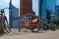 rain station and skyscrapers at Potsdamer Platz in Berlin, Germany, with rental bikes in the foreground Royalty Free Stock Photo