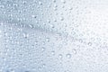 Rain water drops on blue Royalty Free Stock Photo