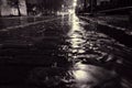 Rain water flowing on a cobblestone street in Helsinki