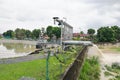 Rain water pumped into river from flood storm retention pond Royalty Free Stock Photo