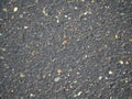 Rain wet surface of tarred road pavement