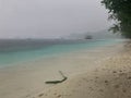 Rain at Yenanas beach, Kabui Bay, Gam island, Raja Ampat - West Papua, Indonesia