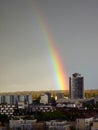 Rainbow above Mulhouse: Europe\'s City of Beautiful Cloudy Skies, Tower Silhouettes, and a Heavy Rain Royalty Free Stock Photo