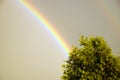 Rainbow against dark threatening sky