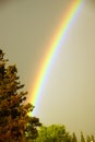 Rainbow against dark threatening sky