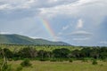 Rainbow against a mountain background, Taita Hills, Kenya
