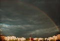 Rainbow, amazing view after rain in the city with Church Royalty Free Stock Photo