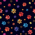 Rainbow animal paw print trails with hearts on a black background. Silhouettes of cat, dog footprint. Brushstroke vector
