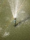 Rainbow appears in spray of fountain Royalty Free Stock Photo