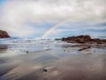 Rainbow at the Itzurun Beach in Zumaia, Basque Country, Spain Royalty Free Stock Photo