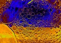 Rainbow background with bubbles, texture of water and oil drops Royalty Free Stock Photo