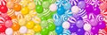 Rainbow background with many round candies