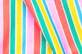Rainbow backgrounds fabric. Closeup of rainbow textile with fresh colorful textured parallel vertical stripes. Abstract summer