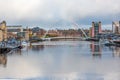 Rainbow behind Gateshead Millennium Bridge over the River Tyne, Newcastle, UK Royalty Free Stock Photo