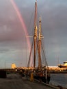 Rainbow behind a sailboat, Skagen Harbour