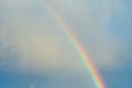 Rainbow in blue sky with white cloud after rain Royalty Free Stock Photo