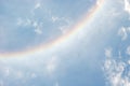 Rainbow on Blue sky with white cloud Royalty Free Stock Photo