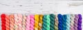 Rainbow border of colorful yarn
