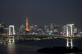 Rainbow Bridge at night and Tokyo Tower Royalty Free Stock Photo